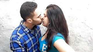Brit Indian Complement of twosome Kissing